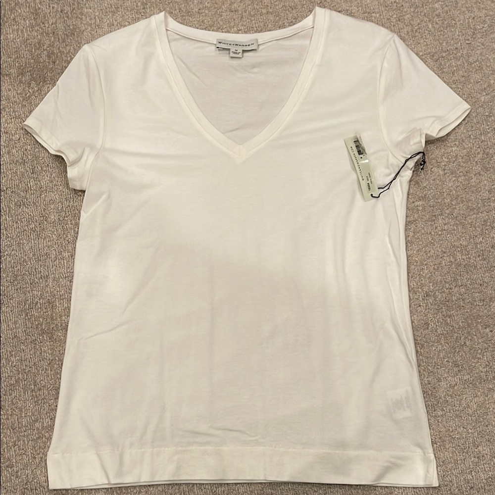 Women’s size medium short sleeve white t-shirt.  New with tags.